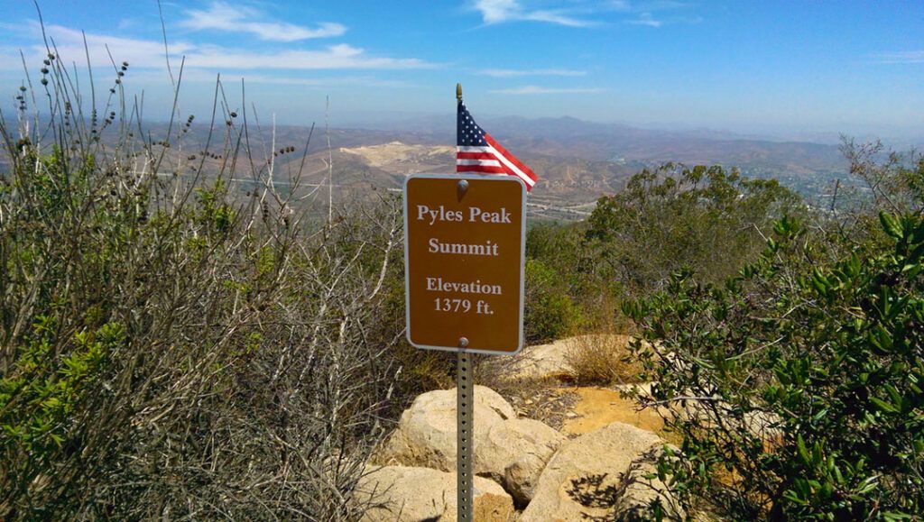 A summit sign on top of Pyles Peak at 1,379 feet.