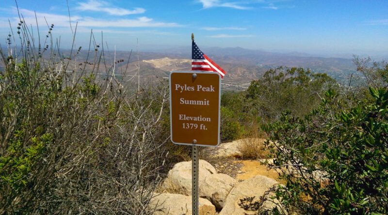A summit sign on top of Pyles Peak at 1,379 feet.