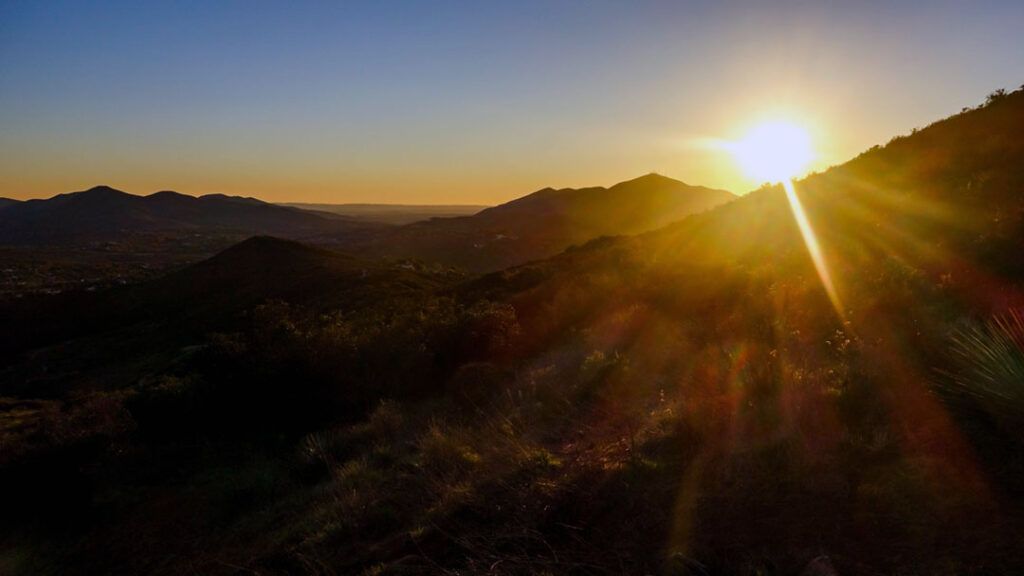 Sun setting over San Miguel Mountain as seen from McGinty Mountain Summit.