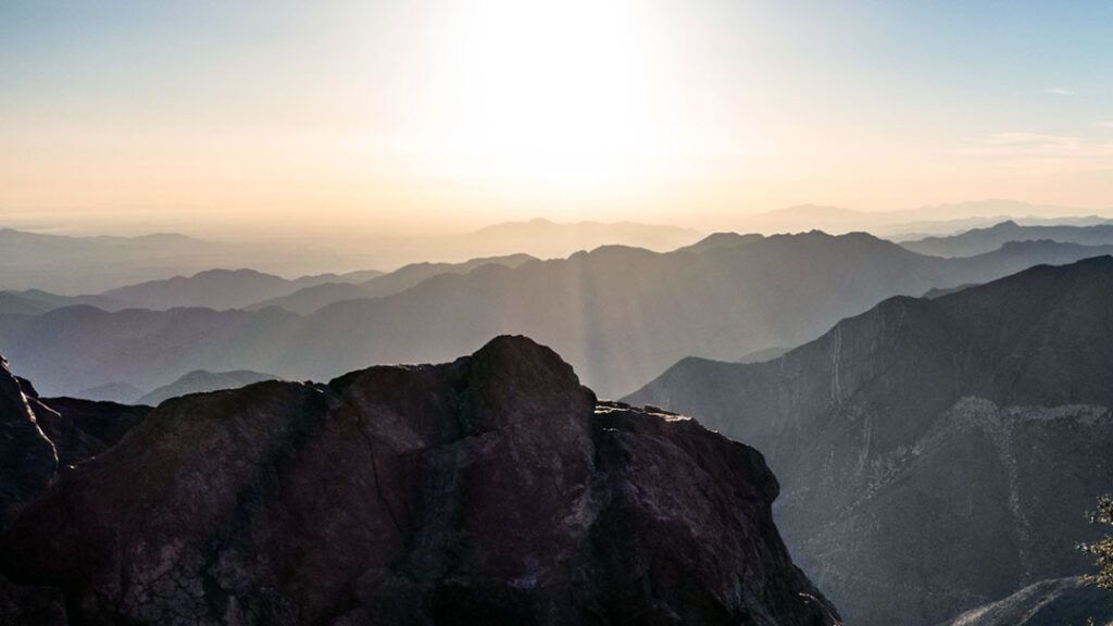 Sunrise over the Sawtooth Mountains viewed from Garnet Peak trail.