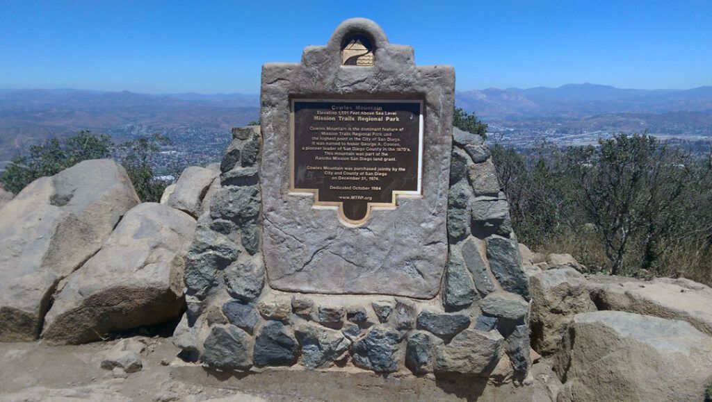 A summit plaque explains the history of Cowles Mountain and Mission Trails Regional Park